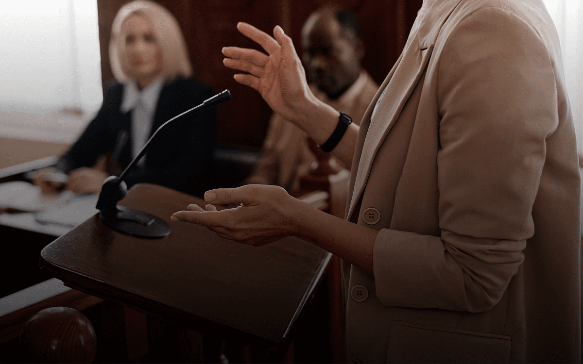 Speaker at courtroom podium