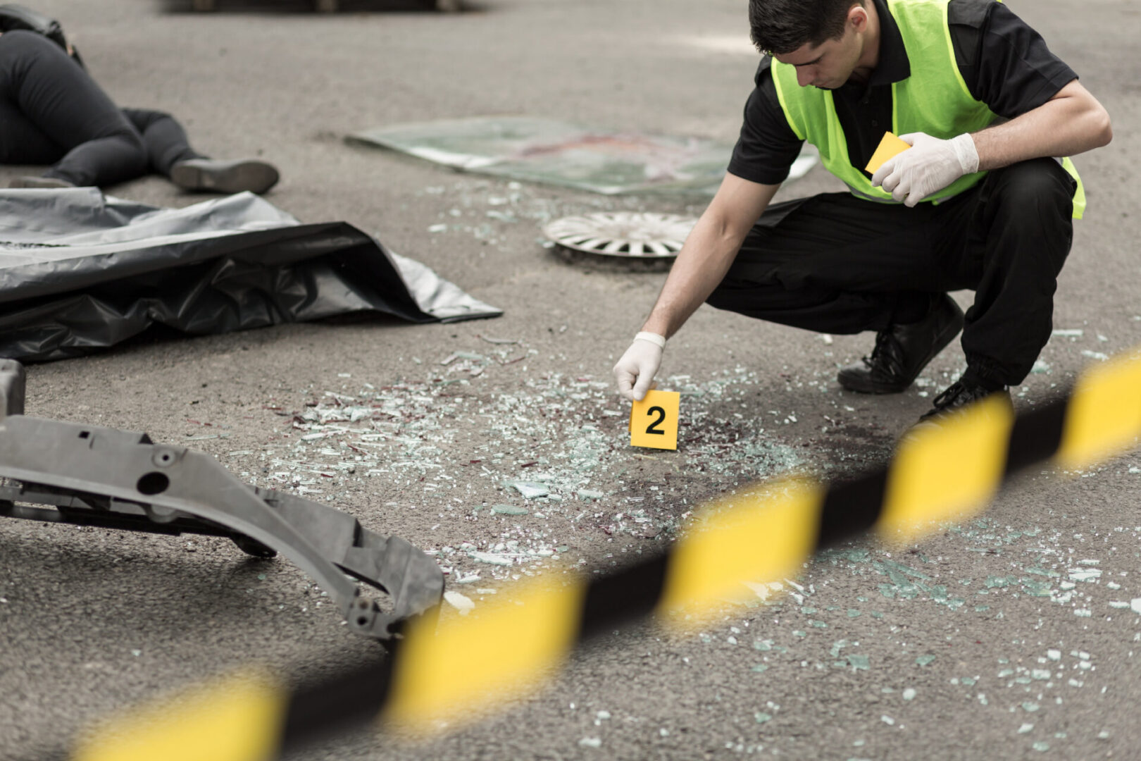 Forensic investigator examining crime scene evidence