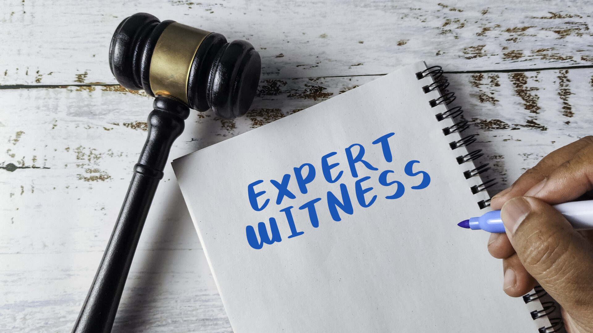 Legal concept with gavel and handwritten note